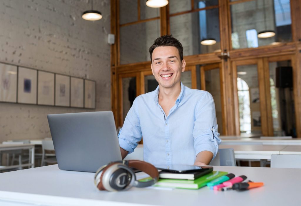 modern-young-confident-man-working-laptop_Website_2